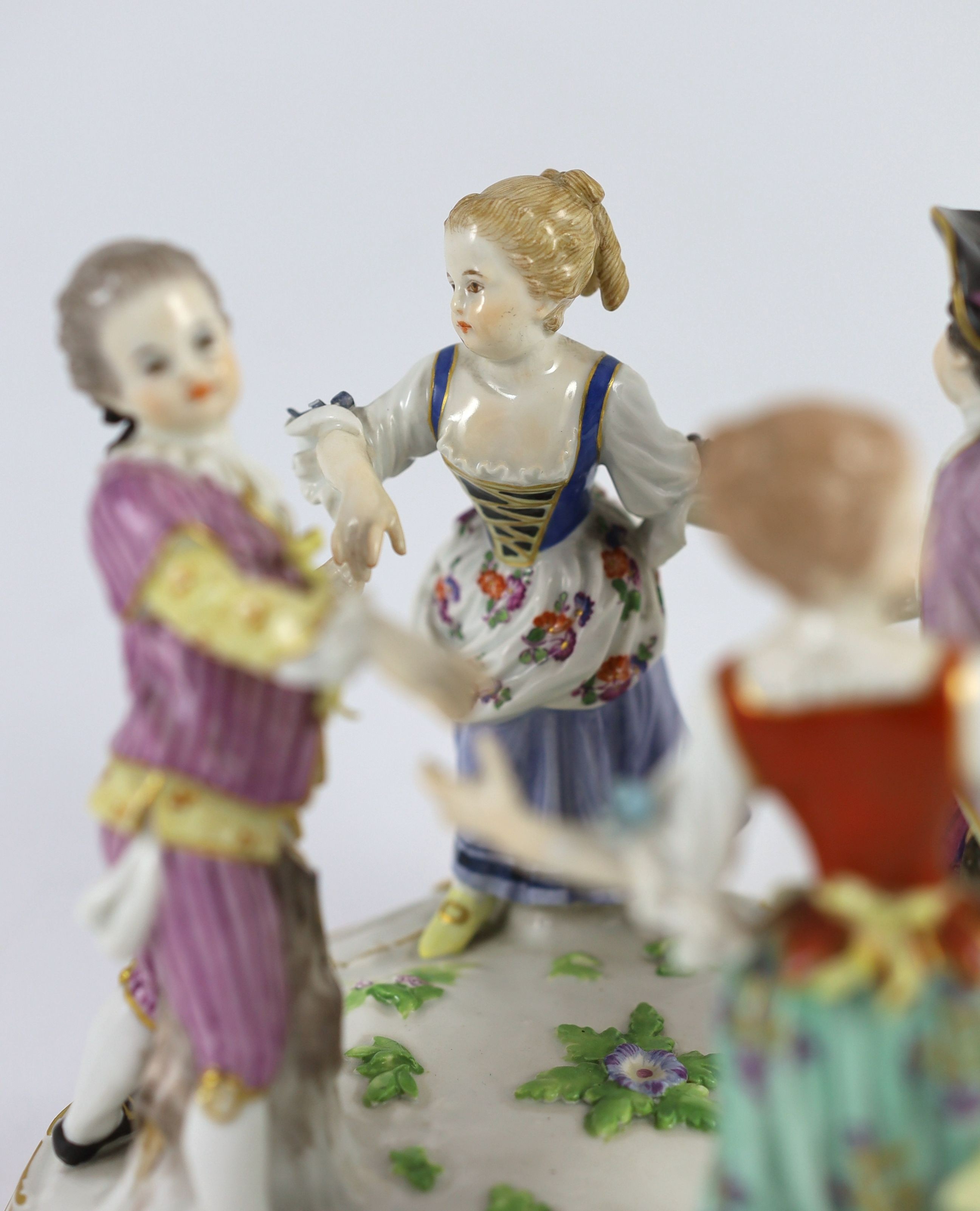 A Meissen group of four dancing children, early 20th century, 15 cm high